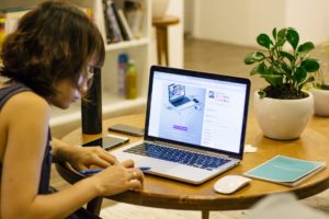 typing on laptop